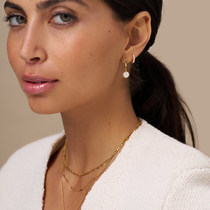 Pearl Drop Huggie Hoop Earrings – Gold by Orelia London