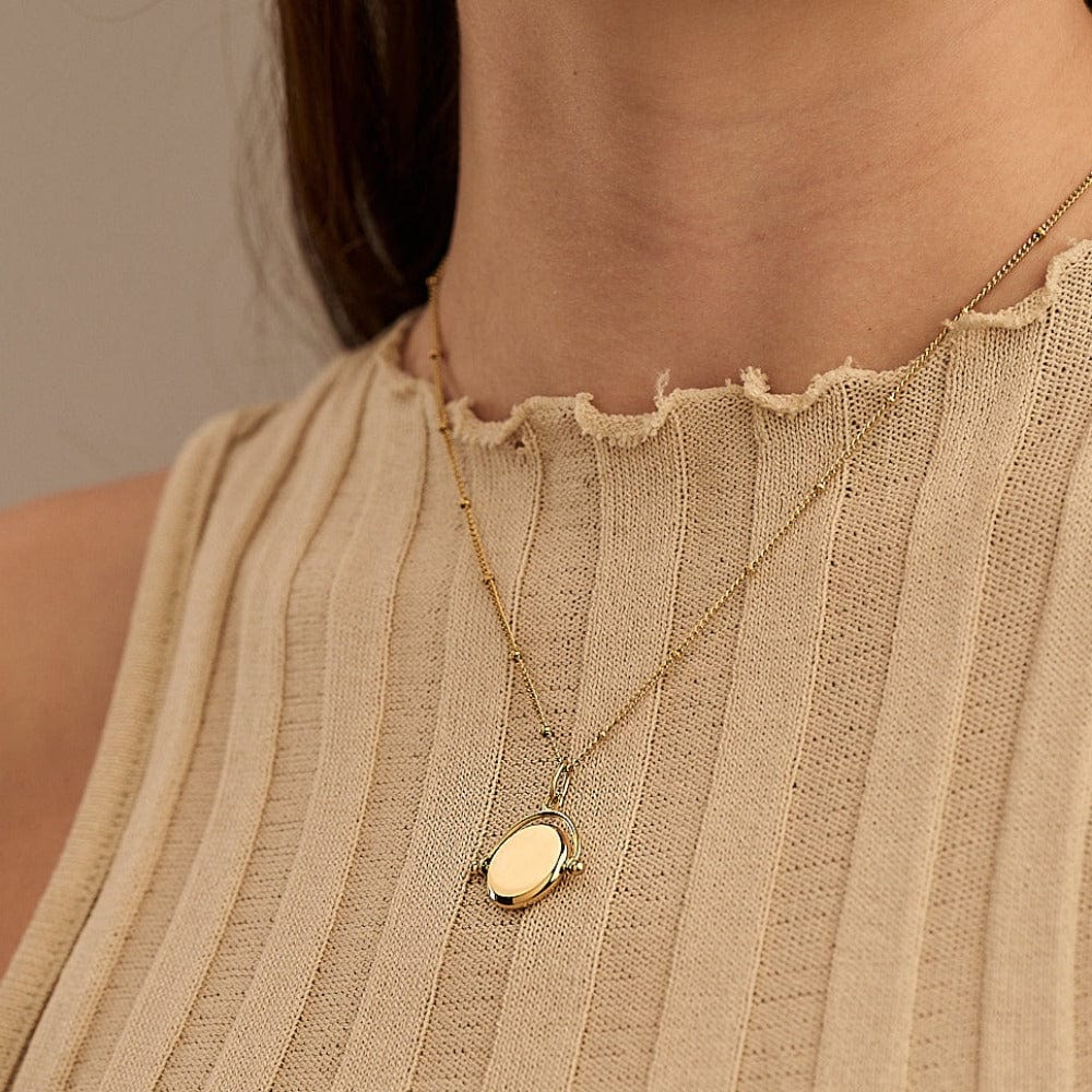 LUXE Faceted Disc Spinner Necklace – Gold by Orelia London