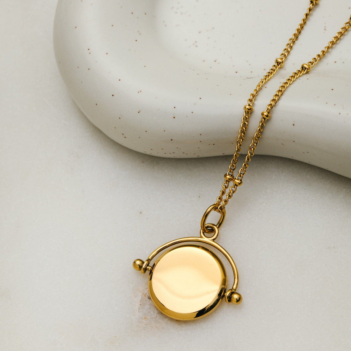 LUXE Faceted Disc Spinner Necklace – Gold by Orelia London