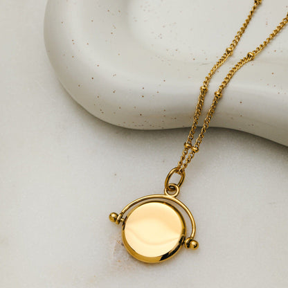 LUXE Faceted Disc Spinner Necklace – Gold by Orelia London