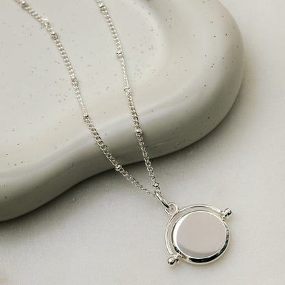 Orelia London LUXE Faceted Disc Spinner Necklace - Silver